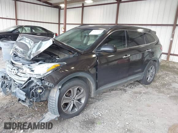2016 Hyundai Santa Fe SE with VIN KM8SMDHFXGU154677, listed as a IAAI auction lot 42573713 with 173,434 mi miles and . Bid and sale history available at DreamBid. Image 2.