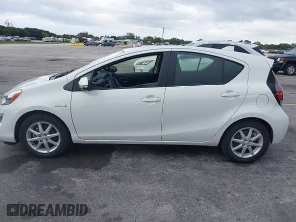 2015 Toyota Prius One z VIN JTDKDTB39F1095411, wystawiony jako IAAI lot #43571290 z przebiegiem 77 477 mil mil oraz . Historia ofert i sprzedaży dostępna na DreamBid. Obrazek 14.