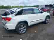 2012 Jeep Grand Cherokee Overland with VIN 1C4RJECG4CC281877, listed as a IAAI auction lot 42705725 with 251,264 mi miles and . Bid and sale history available at DreamBid. Image 4.