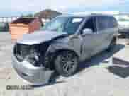 2017 Dodge Grand Caravan SXT with VIN 2C4RDGCG5HR750346, listed as a IAAI auction lot 43351076 with 230,094 mi miles and . Bid and sale history available at DreamBid. Image 2.