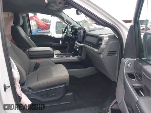 2023 Ford F-150 XL with VIN 1FTFW1E57PKD28761, listed as a IAAI auction lot 43329105 with 26,076 mi miles and . Bid and sale history available at DreamBid. Image 5.