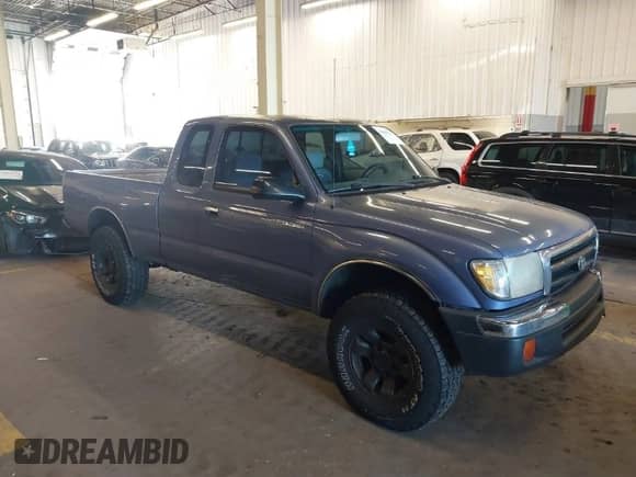 2000 Toyota Tacoma with VIN 4TAWM72N5YZ650056, listed as a IAAI auction lot 41680278 with 257,819 mi miles and . Bid and sale history available at DreamBid. Image 1.
