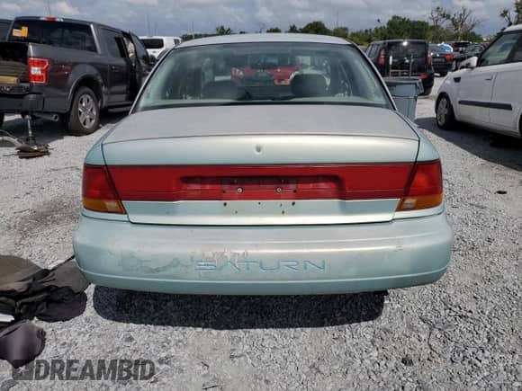 1996 Saturn SL with VIN 1G8ZK5274TZ354087, listed as a Copart auction lot 85761805 with 227,552 mi miles and Non repairable. Bid and sale history available at DreamBid. Image 6.