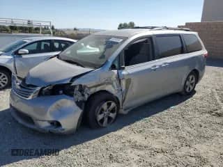 2017 Toyota Sienna LE with VIN 5TDKZ3DC6HS865973, listed as a Copart auction lot 66299065 with 109,992 mi miles and Salvage title. Bid and sale history available at DreamBid. Image 1.