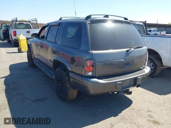 2003 Dodge Durango Sport with VIN 1D4HS38N03F596827, listed as a IAAI auction lot 43272684 with 238,248 mi miles and . Bid and sale history available at DreamBid. Image 3.