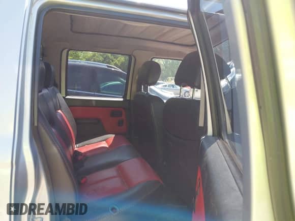 2003 Nissan Frontier SVE with VIN 1N6MD29Y23C421387, listed as a IAAI auction lot 42539324 with 143,031 mi miles and . Bid and sale history available at DreamBid. Image 8.