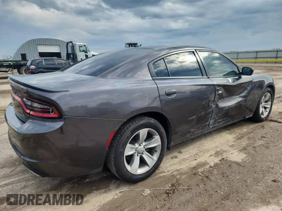 2015 Dodge Charger SE with VIN 2C3CDXBG7FH726886, listed as a Copart auction lot 80687465 with 153,436 mi miles and Salvage title. Bid and sale history available at DreamBid. Image 3.