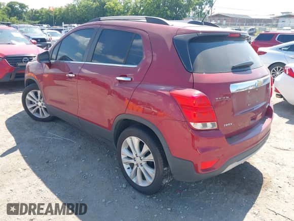 2018 Chevrolet Trax Premier with VIN 3GNCJMSBXJL392304, listed as a IAAI auction lot 42833918 with Not provided miles and . Bid and sale history available at DreamBid. Image 3.