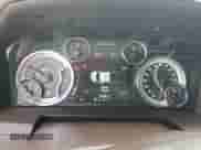 2014 Ram 1500 Laramie z VIN 1C6RR6NT7ES221844, wystawiony jako Copart lot #61636015 z przebiegiem 226 962 mil mil oraz Szkoda całkowita • Salvage title. Historia ofert i sprzedaży dostępna na DreamBid. Obrazek 9.