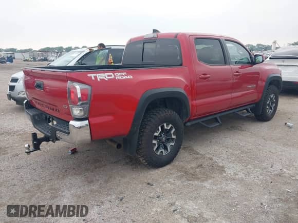 2021 Toyota Tacoma SR5 with VIN 5TFAZ5CN4MX105846, listed as a IAAI auction lot 42275160 with 38,620 mi miles and . Bid and sale history available at DreamBid. Image 4.