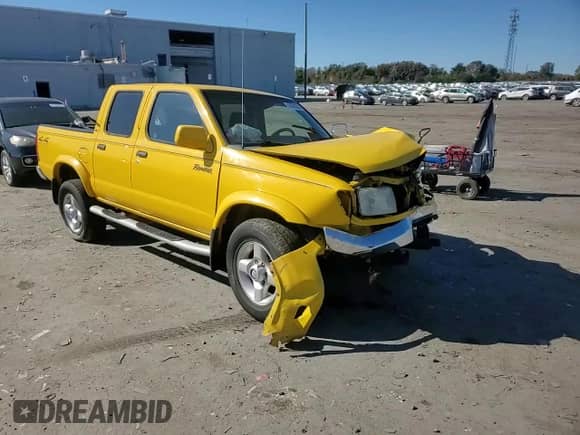 2000 Nissan Frontier XE with VIN 1N6ED27Y4YC349235, listed as a Copart auction lot 84629355 with 216,451 mi miles and Salvage title. Bid and sale history available at DreamBid. Image 13.