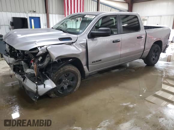 2025 Ram 1500 Tradesman with VIN 1C6RRFGG9SN681811, listed as a Copart auction lot 55799005 with 1,133 mi miles and Salvage title. Bid and sale history available at DreamBid. Image 1.