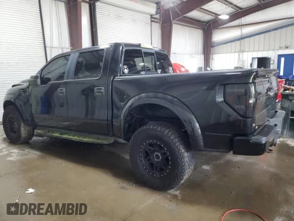2014 Ford F-150 SVT Raptor with VIN 1FTFW1R60EFB80204, listed as a Copart auction lot 82452305 with 184,324 mi miles and Clean title. Bid and sale history available at DreamBid. Image 2.