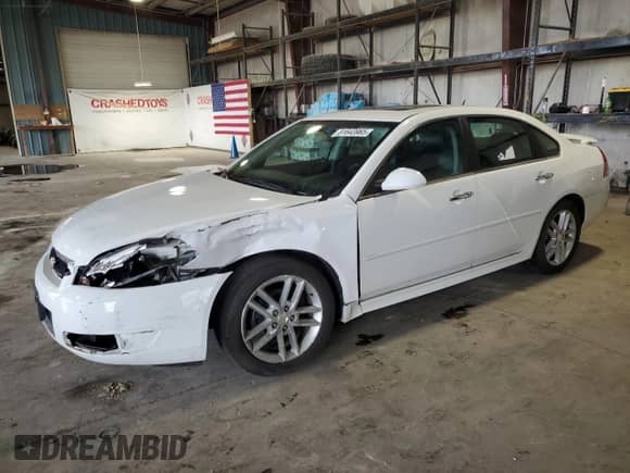 2012 Chevrolet Impala LTZ with VIN 2G1WC5E30C1221083, listed as a Copart auction lot 81643965 with 153,674 mi miles and Salvage title. Bid and sale history available at DreamBid. Image 1.