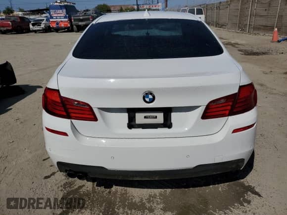 2013 BMW 5 Series 528i with VIN WBAXG5C56DD234251, listed as a Copart auction lot 82192115 with 165,670 mi miles and Salvage title. Bid and sale history available at DreamBid. Image 6.