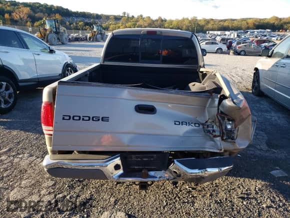 2003 Dodge Dakota SLT with VIN 1D7HL48N53S104919, listed as a Copart auction lot 86832215 with 179,130 mi miles and Salvage title. Bid and sale history available at DreamBid. Image 6.