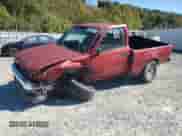 1996 Toyota Tacoma z VIN 4TAPM62N7TZ136944, wystawiony jako Copart lot #82388415 z przebiegiem 203 425 mil mil oraz Szkoda całkowita • Salvage title. Historia ofert i sprzedaży dostępna na DreamBid. Obrazek 1.