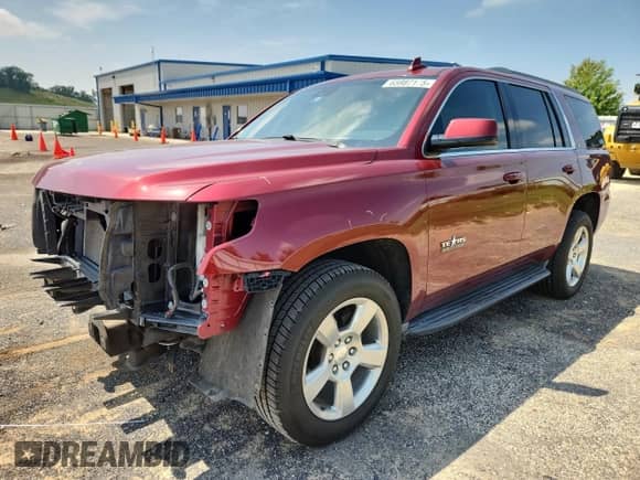 2016 Chevrolet Tahoe LT with VIN 1GNSCBKCXGR311662, listed as a Copart auction lot 65987115 with 168,117 mi miles and Salvage title. Bid and sale history available at DreamBid. Image 1.