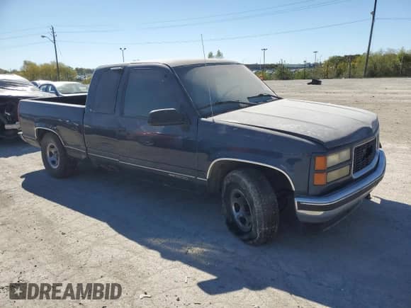 1998 GMC Sierra 1500 z VIN 1GTEC19M8WE556142, wystawiony jako Copart lot #74216184 z przebiegiem 306 795 mil mil oraz Czysty tytuł • Clean title. Historia ofert i sprzedaży dostępna na DreamBid. Obrazek 4.