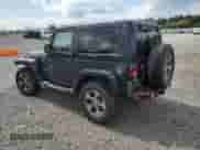 2016 Jeep Wrangler Sahara with VIN 1C4AJWBG4GL140284, listed as a Copart auction lot 64073535 with 101,677 mi miles and Salvage title. Bid and sale history available at DreamBid. Image 2.