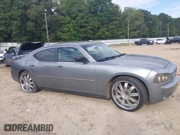 2007 Dodge Charger with VIN 2B3KA43GX7H816727, listed as a IAAI auction lot 43106697 with 183,894 mi miles and . Bid and sale history available at DreamBid. Image 13.