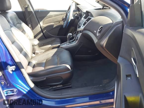 2012 Chevrolet Cruze LTZ z VIN 1G1PH5SC5C7212473, wystawiony jako IAAI lot #43280774 z przebiegiem 87 420 mil mil oraz . Historia ofert i sprzedaży dostępna na DreamBid. Obrazek 5.