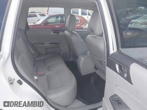 2013 Subaru Forester X Premium z VIN JF2SHADC9DH402670, wystawiony jako IAAI lot #43322189 z przebiegiem 93 140 mil mil oraz . Historia ofert i sprzedaży dostępna na DreamBid. Obrazek 8.