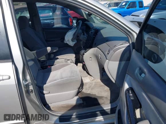 2005 Toyota Sienna CE with VIN 5TDZA23CX5S288782, listed as a IAAI auction lot 42991430 with 220,506 mi miles and . Bid and sale history available at DreamBid. Image 5.