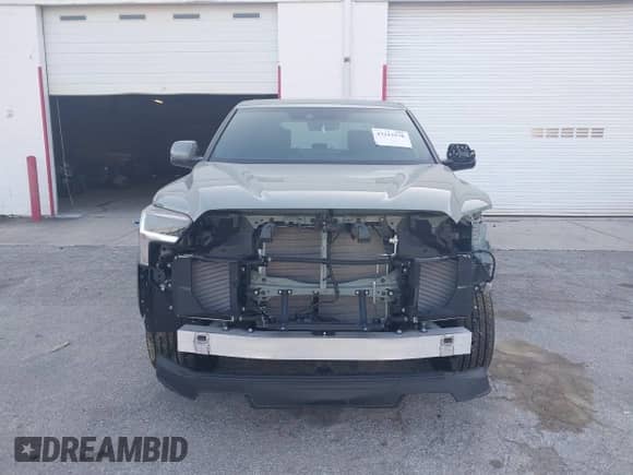 2025 Toyota Tundra Limited with VIN 5TFJA5DB3SX323804, listed as a IAAI auction lot 43213270 with 202 mi miles and . Bid and sale history available at DreamBid. Image 12.