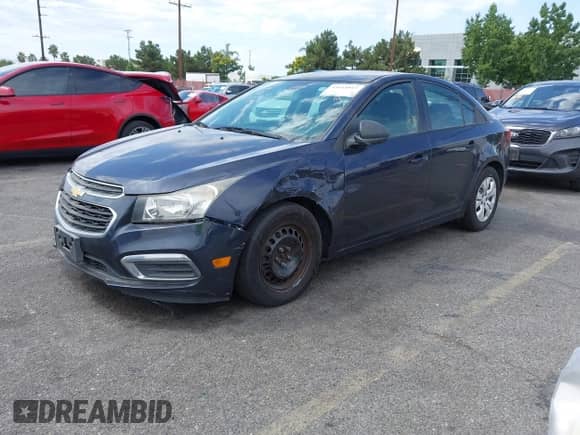 2015 Chevrolet Cruze LS with VIN 1G1PB5SG2F7175200, listed as a IAAI auction lot 43114817 with 129,048 mi miles and . Bid and sale history available at DreamBid. Image 2.