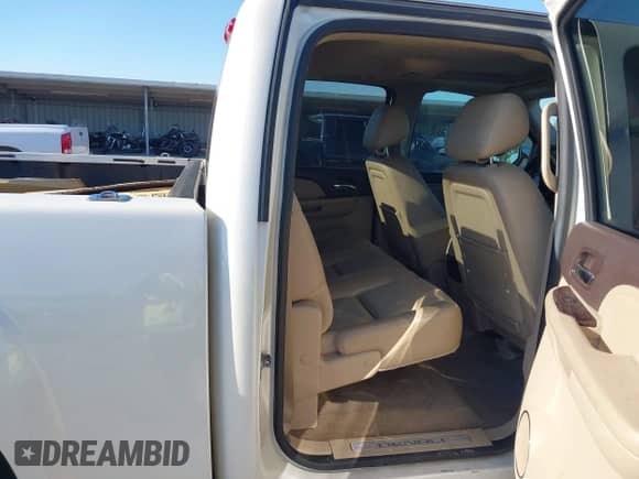 2013 GMC Sierra 1500 Denali z VIN 3GTP2XE24DG345268, wystawiony jako IAAI lot #43357777 z przebiegiem 168 765 mil mil oraz . Historia ofert i sprzedaży dostępna na DreamBid. Obrazek 8.