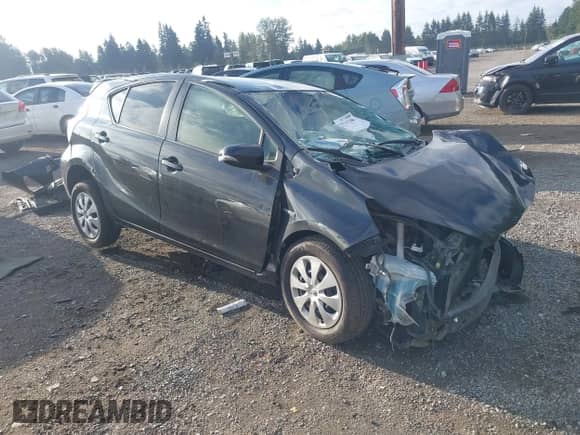 2014 Toyota Prius One z VIN JTDKDTB33E1572512, wystawiony jako IAAI lot #43165748 z przebiegiem 169 581 mil mil oraz . Historia ofert i sprzedaży dostępna na DreamBid. Obrazek 1.