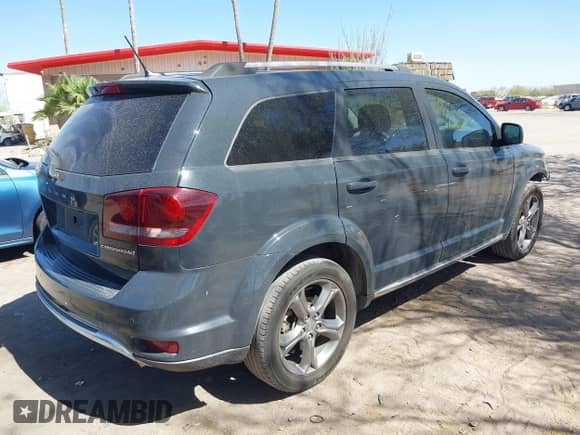 2017 Dodge Journey Crossroad with VIN 3C4PDCGG9HT605575, listed as a IAAI auction lot 42272881 with 162,164 mi miles and . Bid and sale history available at DreamBid. Image 4.
