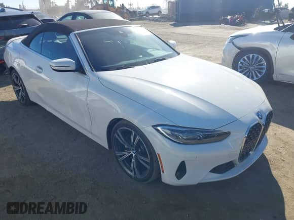 2022 BMW 4 Series 430i with VIN WBA23AT00NCJ33717, listed as a IAAI auction lot 43362808 with 72,222 mi miles and . Bid and sale history available at DreamBid. Image 1.