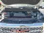 2021 GMC Sierra 1500 Denali z VIN 3GTU9FEL5MG317982, wystawiony jako Copart lot #68023805 z przebiegiem 91 345 mil mil oraz Szkoda całkowita • Salvage title. Historia ofert i sprzedaży dostępna na DreamBid. Obrazek 11.