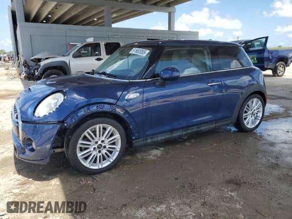 2014 MINI Hardtop S with VIN WMWXM7C52ET986993, listed as a Copart auction lot 61662055 with 99,544 mi miles and Clean title. Bid and sale history available at DreamBid. Image 1.