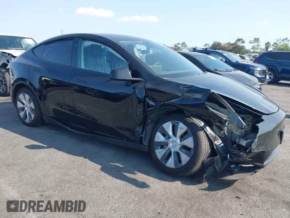 2023 Tesla Model Y Long Range z VIN 7SAYGAEE9PF851348, wystawiony jako IAAI lot #43167064 z przebiegiem Nie podano mil oraz . Historia ofert i sprzedaży dostępna na DreamBid. Obrazek 1.