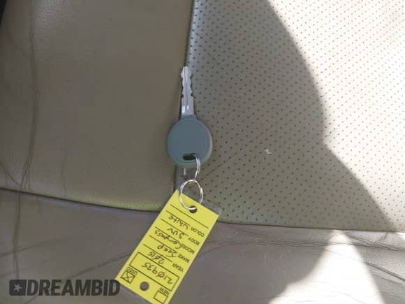 2015 Jeep Compass High Altitude with VIN 1C4NJCEA8FD210935, listed as a IAAI auction lot 43526780 with 195,054 mi miles and . Bid and sale history available at DreamBid. Image 11.