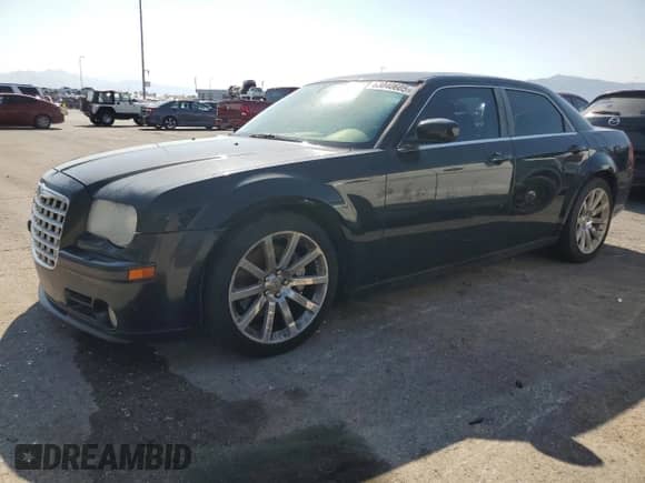 2006 Chrysler 300 C SRT-8 с VIN 2C3LA73W56H102728, выставлен на аукционе Copart как лот 63040605 с пробегом 145 411 миль миль и Чистый • Clean title. История ставок и продаж доступна на DreamBid. Изображение 1.