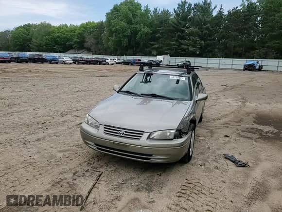 1997 Toyota Camry LE z VIN JT2BF22K2V0048990, wystawiony jako Copart lot #58781925 z przebiegiem 146 216 mil mil oraz Szkoda całkowita • Salvage title. Historia ofert i sprzedaży dostępna na DreamBid. Obrazek 13.