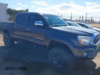 2015 Toyota Tacoma PreRunner z VIN 3TMJU4GN9FM185799, wystawiony jako IAAI lot #41786874 z przebiegiem 65 979 mil mil oraz . Historia ofert i sprzedaży dostępna na DreamBid. Obrazek 1.