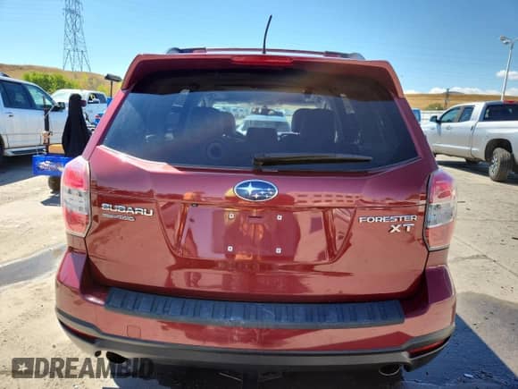 2014 Subaru Forester XT Touring z VIN JF2SJGMC1EH409721, wystawiony jako Copart lot #81140985 z przebiegiem 78 296 mil mil oraz Szkoda całkowita • Salvage title. Historia ofert i sprzedaży dostępna na DreamBid. Obrazek 6.