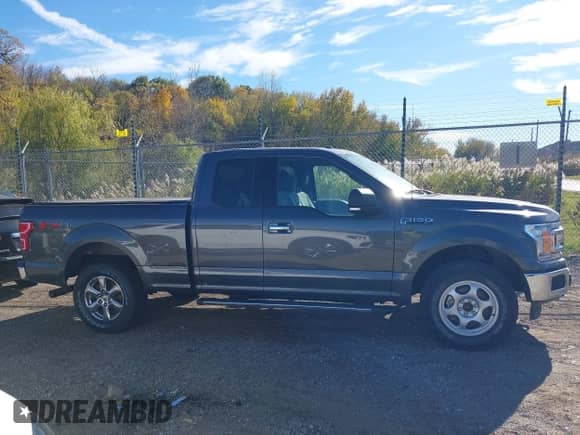 2018 Ford F-150 XL z VIN 1FTFX1EG8JKF78371, wystawiony jako IAAI lot #43545584 z przebiegiem 164 505 mil mil oraz . Historia ofert i sprzedaży dostępna na DreamBid. Obrazek 13.