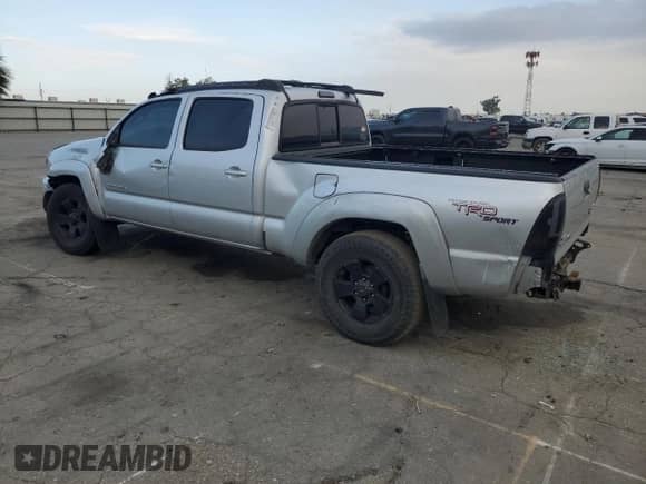 2008 Toyota Tacoma PreRunner with VIN 3TMKU72N98M015846, listed as a Copart auction lot 82139065 with 210,053 mi miles and Salvage title. Bid and sale history available at DreamBid. Image 2.