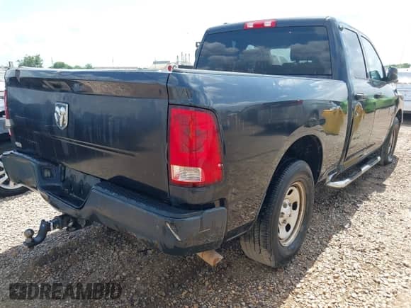 2013 Ram 1500 Tradesman with VIN 1C6RR6FG8DS572519, listed as a IAAI auction lot 42091650 with 154,323 mi miles and . Bid and sale history available at DreamBid. Image 4.