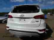 2018 Hyundai Santa Fe 2.4L с VIN 5NMZTDLBXJH107951, выставлен на аукционе Copart как лот 70637735 с пробегом 105 415 миль миль и Списание • Salvage title. История ставок и продаж доступна на DreamBid. Изображение 6.