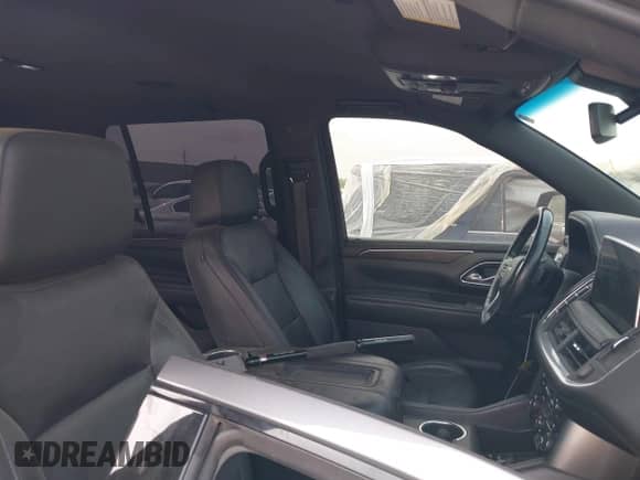 2021 Chevrolet Tahoe LT z VIN 1GNSKNKD9MR240236, wystawiony jako IAAI lot #42302155 z przebiegiem 84 897 mil mil oraz . Historia ofert i sprzedaży dostępna na DreamBid. Obrazek 5.