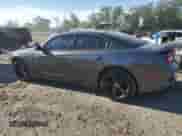 2014 Dodge Charger SXT with VIN 2C3CDXHGXEH348567, listed as a Copart auction lot 84801005 with 59,295 mi miles and Salvage title. Bid and sale history available at DreamBid. Image 2.