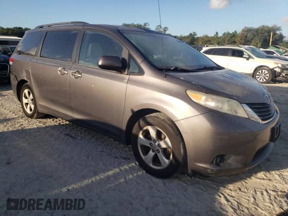 2012 Toyota Sienna LE with VIN 5TDKK3DC5CS231390, listed as a Copart auction lot 85662385 with 125,918 mi miles and Salvage title. Bid and sale history available at DreamBid. Image 4.