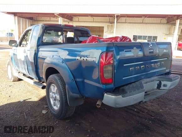 2003 Nissan Frontier XE z VIN 1N6ED26T03C413995, wystawiony jako IAAI lot #43089760 z przebiegiem 137 313 mil mil oraz . Historia ofert i sprzedaży dostępna na DreamBid. Obrazek 3.